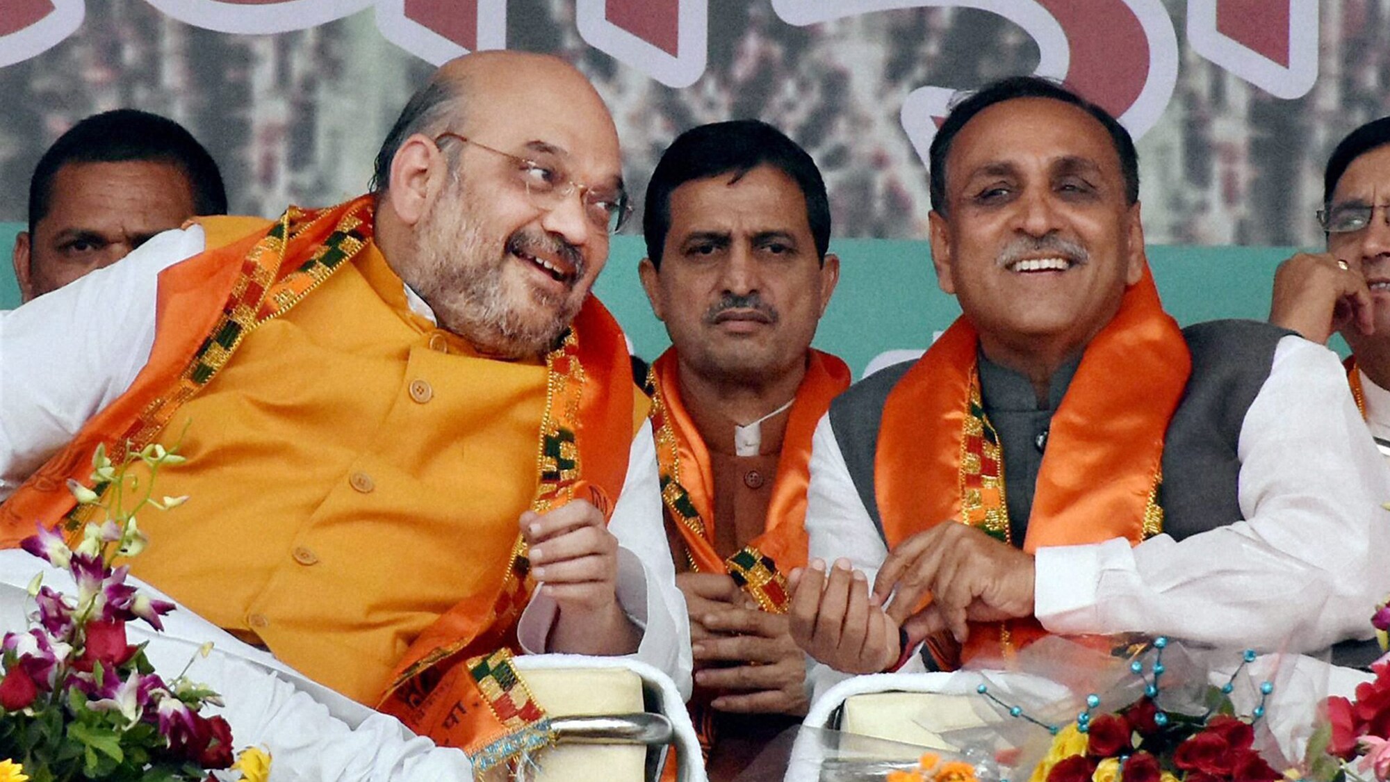The support of Sangh, Amit Shah and Modi is in itself a strong element in Vijay Rupani's favour. (Photo: PTI)